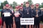 Druzyna MDP Bibianna w granatowych dresach i czerwonych czapkach
